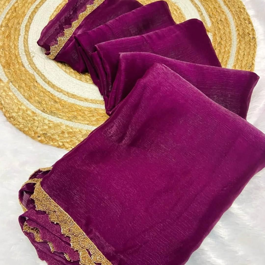 Purple colour Shimmer chiffon saree with golden beads lace border