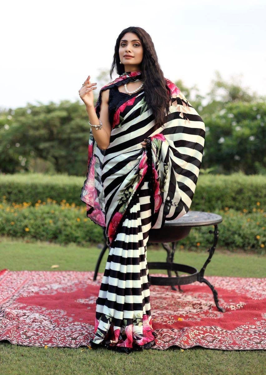 Soft & smooth satin Georgette geometrical strips print with floral print border comes with sequence work lace