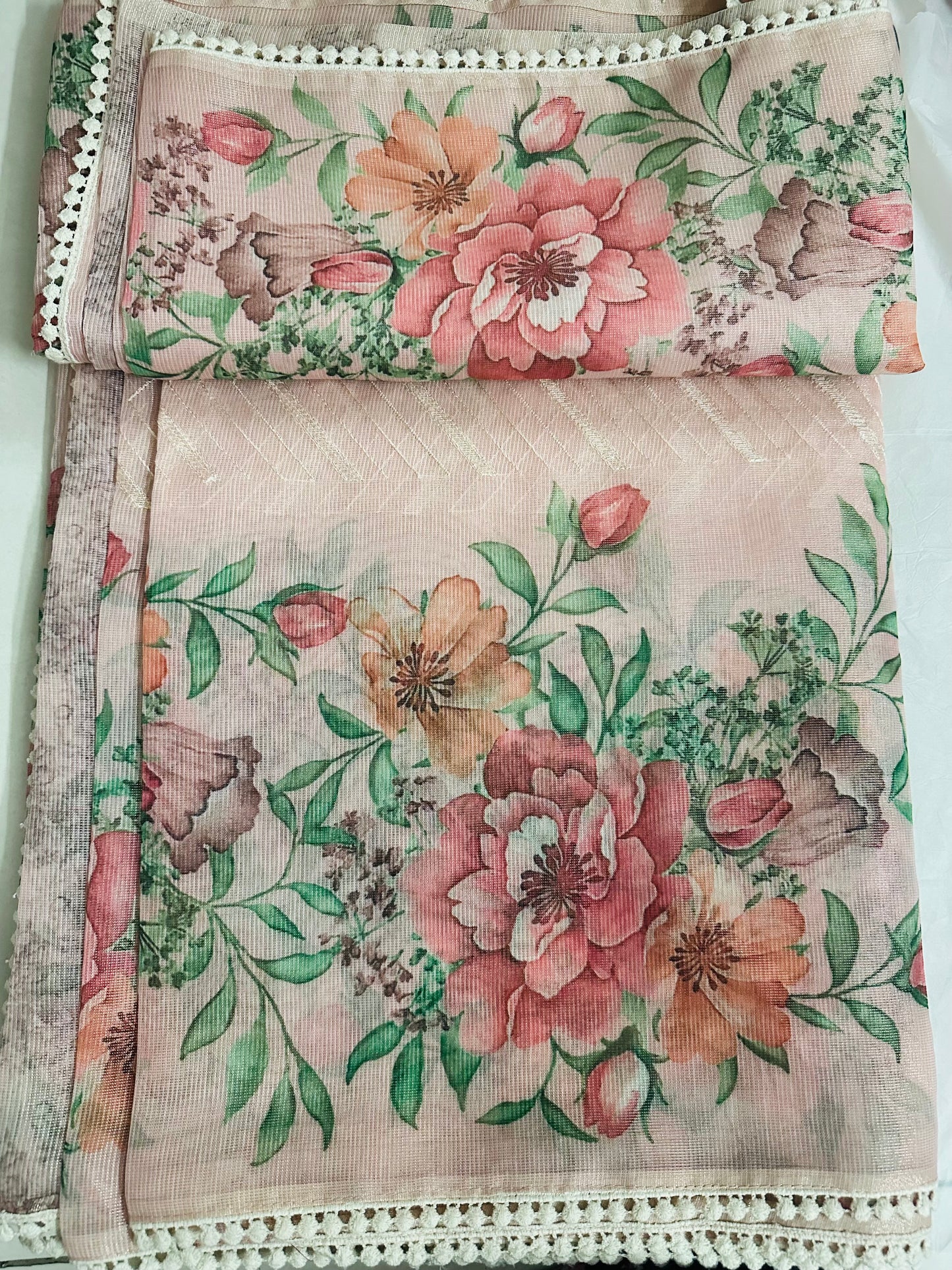 Elegant Peach Colour Floral Printed Tissue Saree with lace border