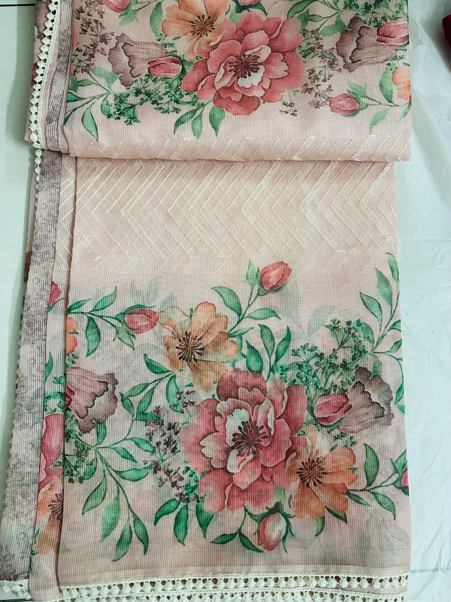Elegant Peach Colour Floral Printed Tissue Saree with lace border