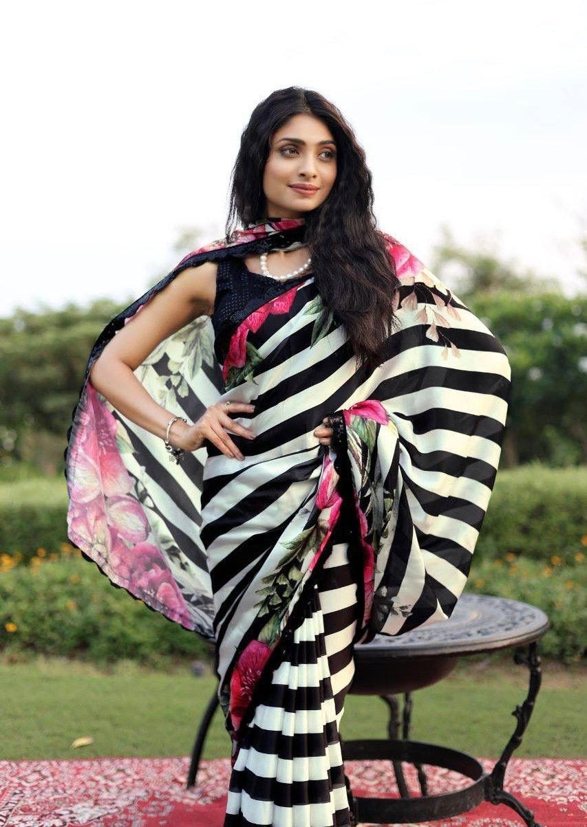 Soft & smooth satin Georgette geometrical strips print with floral print border comes with sequence work lace